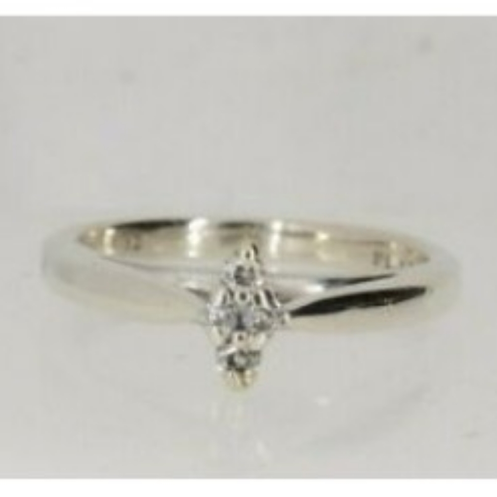 Woman's Diamond Cluster platinum Ring. Size 9